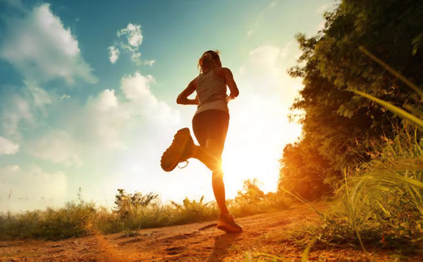 Energetic person running demonstrating drink more water to be healthy
