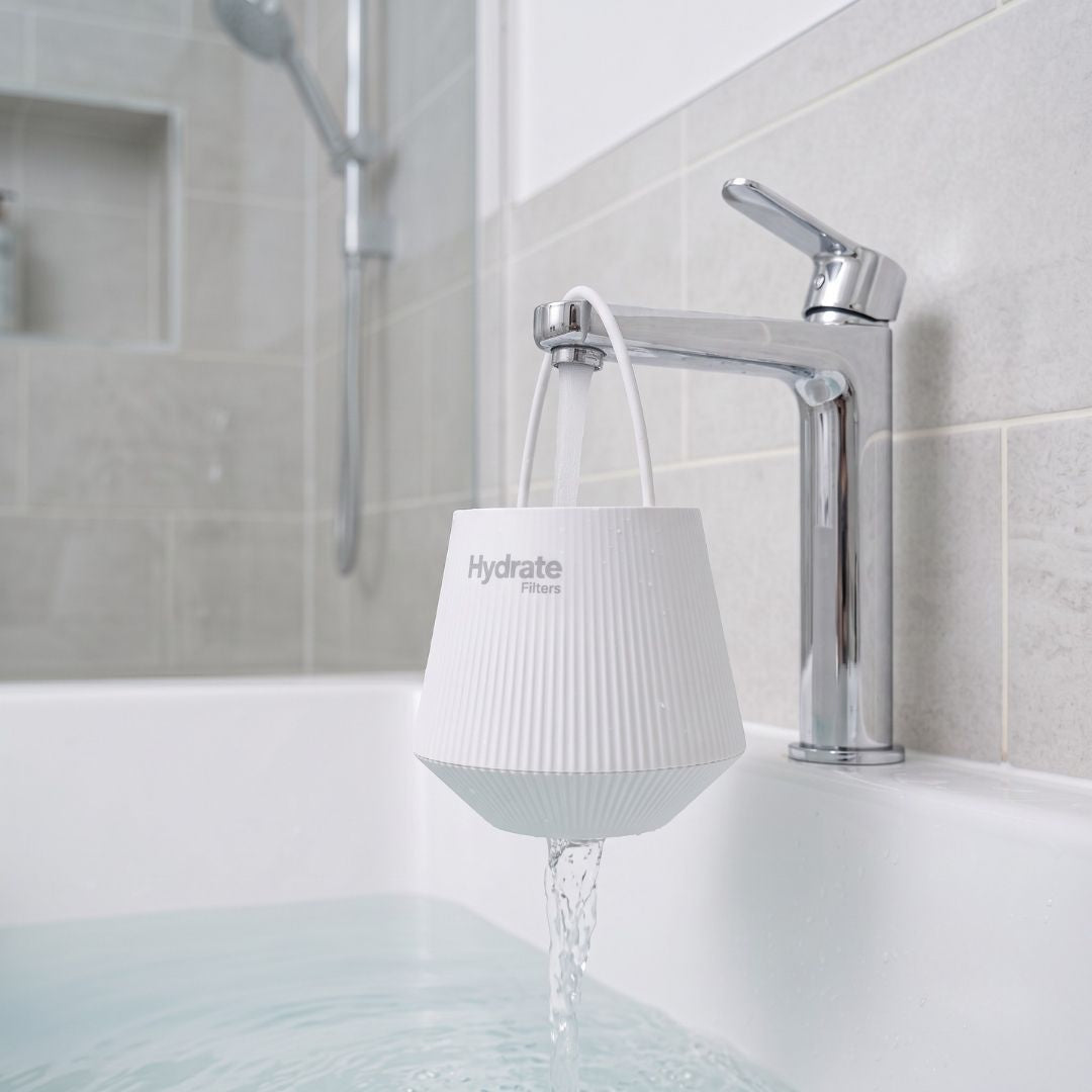 Hydrate bath filter being used to fill a bath with filtered water.