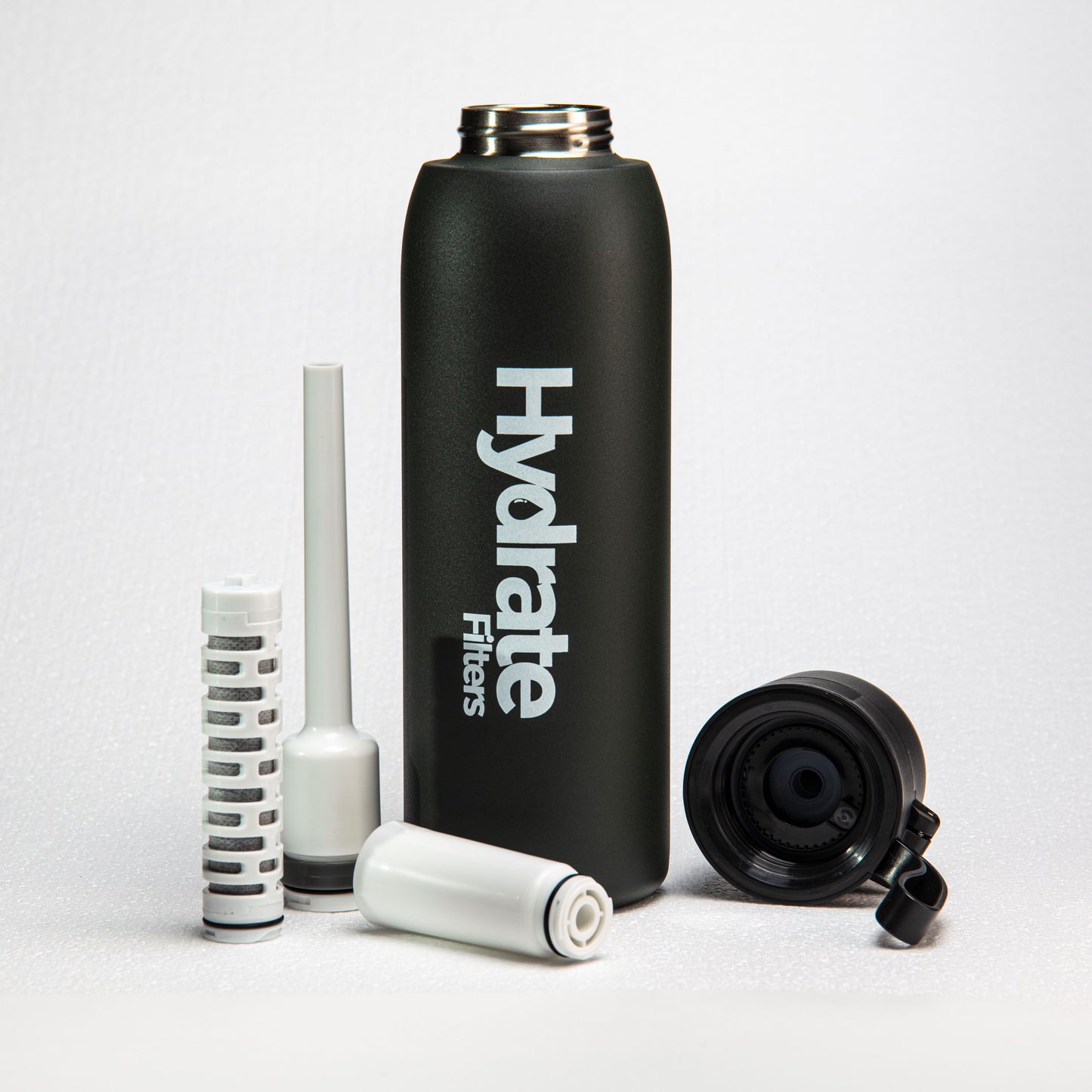 Water bottle with the top removed showing the filtration straw and filter