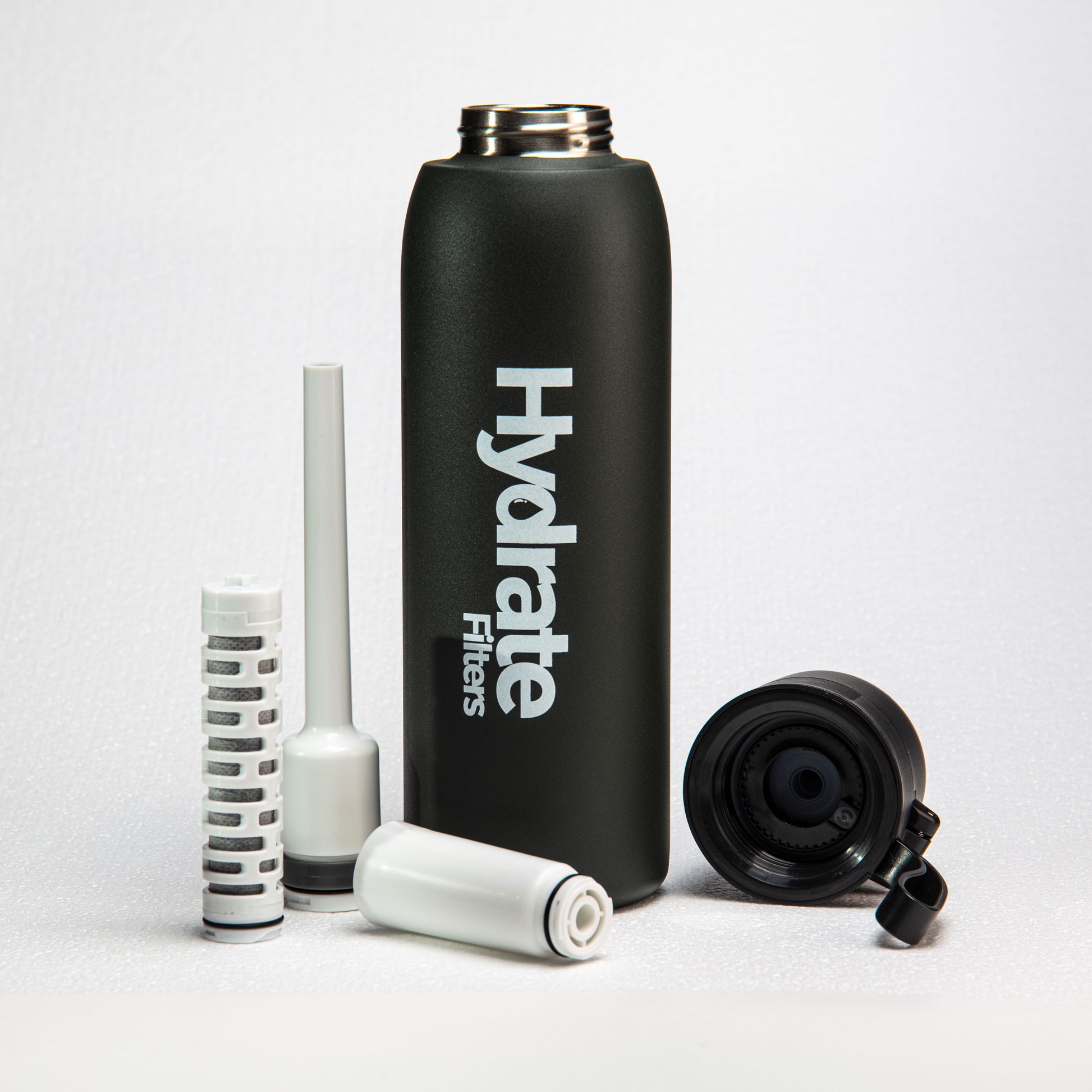 Water bottle with the top removed showing the filtration straw and filter